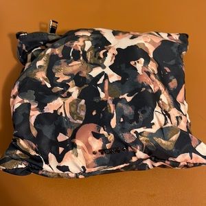 Tumi medium size backpack with packable pouch